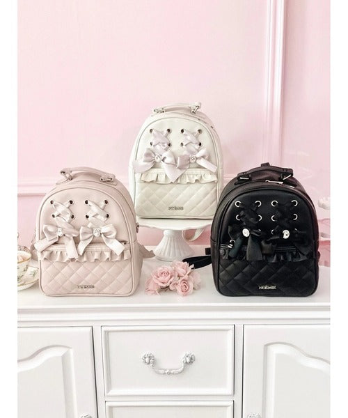 NOÉMIE Lace-up quilted backpack