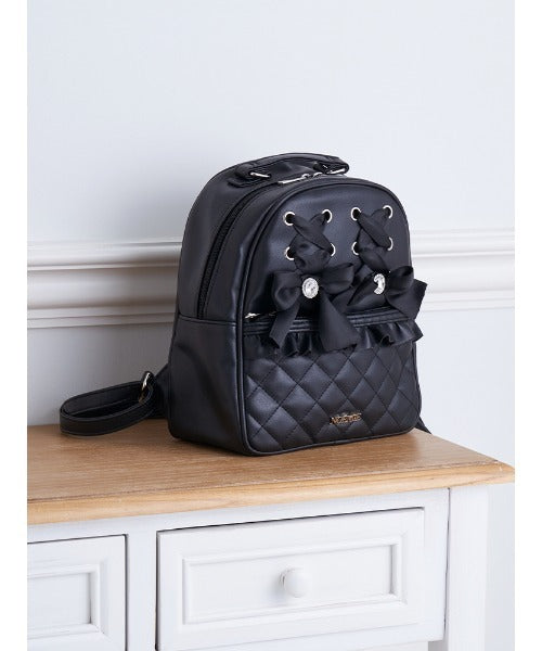 NOÉMIE Lace-up quilted backpack